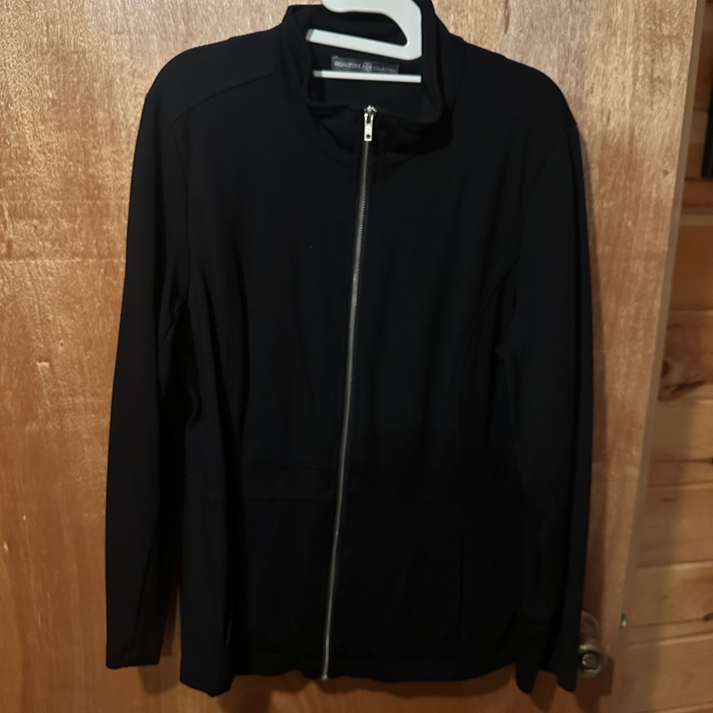 Zip up stretch jacket. Great for spring or fall mornings
